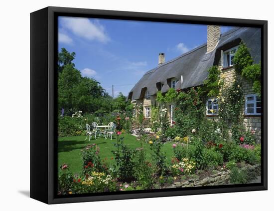 Thatched Cottages in the Cotswolds, Gloucestershire, England, UK-Rainford Roy-Framed Stretched Canvas