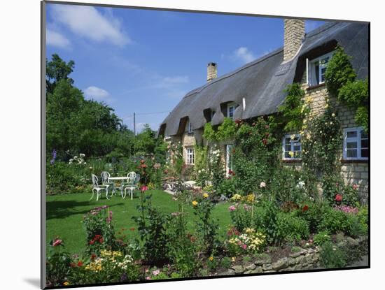 Thatched Cottages in the Cotswolds, Gloucestershire, England, UK-Rainford Roy-Mounted Photographic Print