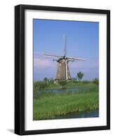 Thatched Windmills on the Canal at Kinderdijk, UNESCO World Heritage Site, Holland, Europe-Rainford Roy-Framed Photographic Print
