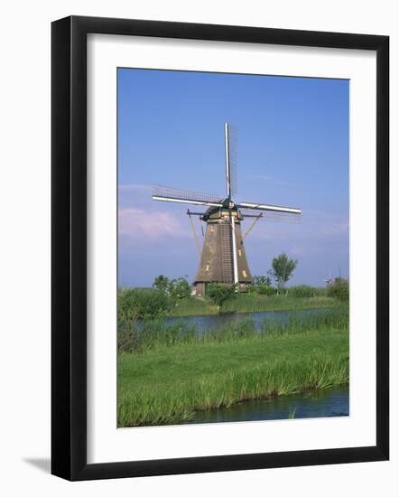 Thatched Windmills on the Canal at Kinderdijk, UNESCO World Heritage Site, Holland, Europe-Rainford Roy-Framed Photographic Print