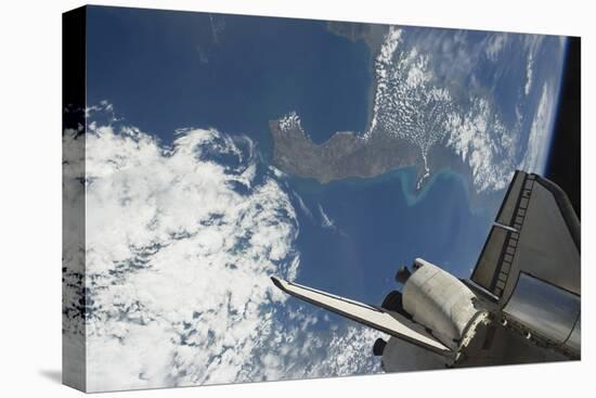 The Aft Part of Space Shuttle Endeavour Backdropped Against a Part of Earth-null-Stretched Canvas