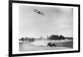 The Airplane Races the Automobile-null-Framed Photo