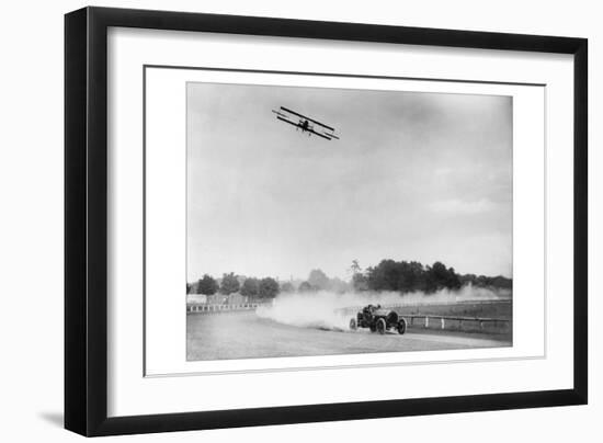 The Airplane Races the Automobile-null-Framed Photo