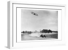 The Airplane Races the Automobile-null-Framed Photo