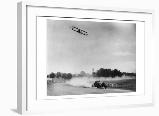 The Airplane Races the Automobile-null-Framed Art Print