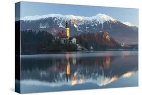 The Assumption of Mary Pilgrimage Church on Lake Bled and Bled Castle, Bled, Slovenia, Europe-Miles Ertman-Stretched Canvas