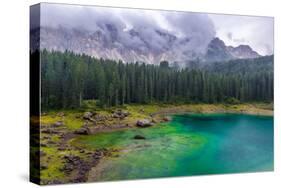 The Astonishing Colours of the Water of the Karersee, in Trentino, During a Rainy Day-Fabio Lotti-Stretched Canvas