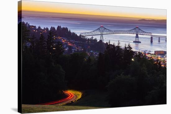 The Astoria-Megler Bridge over the Columbia River & the town of Astoria, Oregon, USA-Mark A Johnson-Stretched Canvas