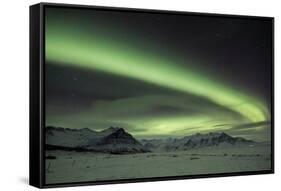 The Aurora Borealis in Iceland with Mountains in the Background-Alex Saberi-Framed Stretched Canvas