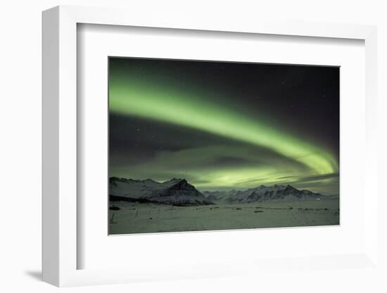 The Aurora Borealis in Iceland with Mountains in the Background-Alex Saberi-Framed Photographic Print