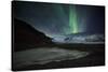 The Aurora Borealis over a Glacier in the Skaftafell National Park in Iceland-Alex Saberi-Stretched Canvas