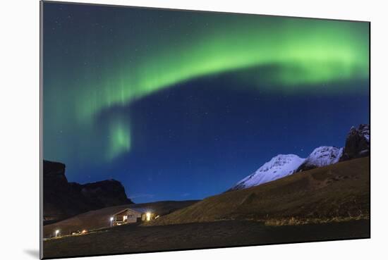 The Aurora Borealis Wraps Around The Mountain In Southern Iceland-Joe Azure-Mounted Photographic Print