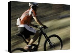 The Back of a Mountain Biker, Mt. Bike-Michael Brown-Stretched Canvas