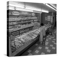 The Bakery Counter at the Asda Supermarket in Rotherham, South Yorkshire, 1969-Michael Walters-Stretched Canvas