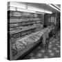 The Bakery Counter at the Asda Supermarket in Rotherham, South Yorkshire, 1969-Michael Walters-Stretched Canvas