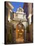 The Balbi Arch and Pedestrianized Grisia Illuminated at Dusk, Rovinj (Rovigno), Istria, Croatia-Ruth Tomlinson-Stretched Canvas