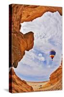 The Balloon Flies above a Picturesque Slot-Hole Canyon in Desert-kavram-Stretched Canvas