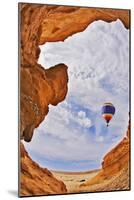 The Balloon Flies above a Picturesque Slot-Hole Canyon in Desert-kavram-Mounted Photographic Print