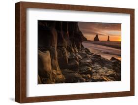 The basalt rock formations in the sea on Reynisfjara Beach in Vik, Iceland at sunrise.-Alex Saberi-Framed Photographic Print