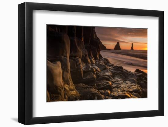 The basalt rock formations in the sea on Reynisfjara Beach in Vik, Iceland at sunrise.-Alex Saberi-Framed Photographic Print