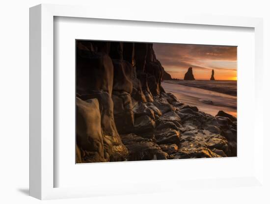 The basalt rock formations in the sea on Reynisfjara Beach in Vik, Iceland at sunrise.-Alex Saberi-Framed Photographic Print