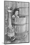 'The bath is a large barrel with charcoal stove. Frequently out of doors', c1900, (1921)-Julian Leonard Street-Mounted Photographic Print