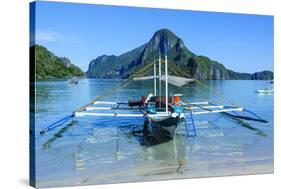 The Bay of El Nido with Outrigger Boats, Bacuit Archipelago, Palawan, Philippines-Michael Runkel-Stretched Canvas