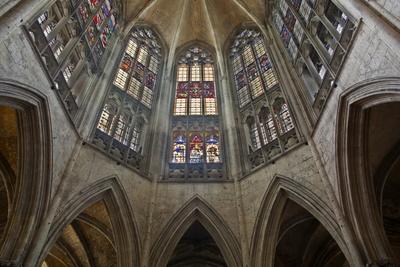 https://imgc.allpostersimages.com/img/posters/the-beautiful-stained-glass-above-the-choir-in-the-abbaye-de-la-trinite_u-L-PNEZVD0.jpg?artPerspective=n