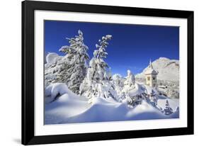 The bell tower submerged by snow surrounded by woods Maloja Canton of Engadine Switzerland Europe-ClickAlps-Framed Photographic Print
