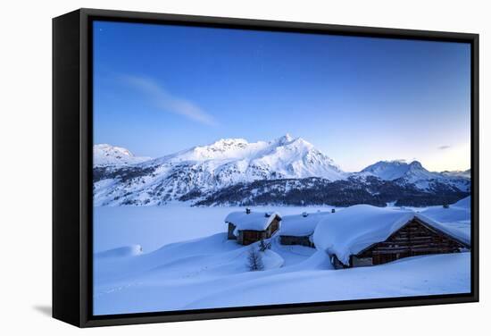 The Blue Hour Leaving its Place to the Night over Some Scattered Huts in Spluga by the Maloja Pass-Roberto Moiola-Framed Stretched Canvas