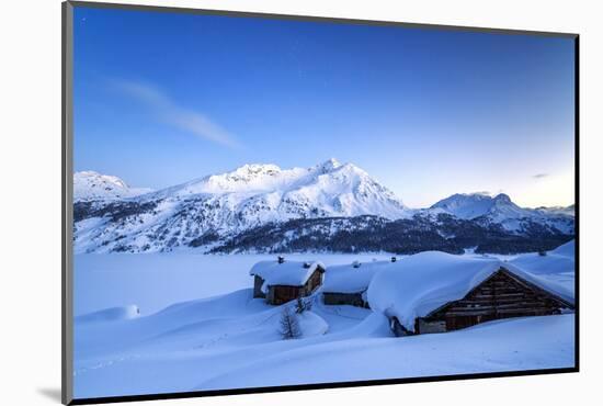 The Blue Hour Leaving its Place to the Night over Some Scattered Huts in Spluga by the Maloja Pass-Roberto Moiola-Mounted Photographic Print