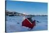 The blue light of dusk on the typical house of fishermen and frozen sea, Fjordbotn, Senja, Norway-Roberto Moiola-Stretched Canvas