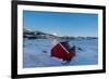 The blue light of dusk on the typical house of fishermen and frozen sea, Fjordbotn, Senja, Norway-Roberto Moiola-Framed Photographic Print