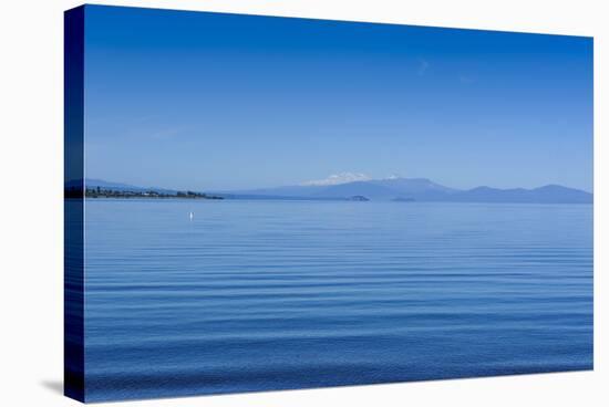 The Blue Waters of Lake Taupo with the Tongariro National Park in the Background-Michael-Stretched Canvas