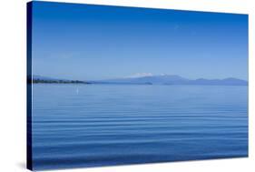 The Blue Waters of Lake Taupo with the Tongariro National Park in the Background-Michael-Stretched Canvas