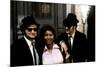 THE BLUES BROTHERS, 1980 directed by JOHN LANDIS Aretha Franklin between John Belushi and Dan Aykro-null-Mounted Photo