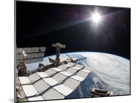 The Bright Sun, a Portion of the International Space Station And Earth's Horizon-Stocktrek Images-Mounted Premium Photographic Print