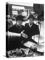 The Butcher Rationing the Amount of Meat Sold to the Customers Because of the Postwar Meat Shortage-Cornell Capa-Stretched Canvas