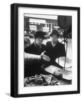 The Butcher Rationing the Amount of Meat Sold to the Customers Because of the Postwar Meat Shortage-Cornell Capa-Framed Premium Photographic Print