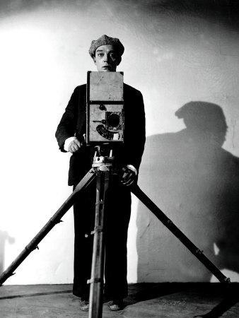 https://imgc.allpostersimages.com/img/posters/the-cameraman-buster-keaton-1928_u-L-P6S0KO0.jpg?artPerspective=n