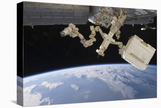 The Canadian-Built Dextre Backdropped by Earth's Horizon-null-Stretched Canvas