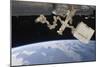 The Canadian-Built Dextre Backdropped by Earth's Horizon-null-Mounted Photographic Print