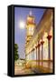 The Cao Dai temple in Vung Tau lit up at dusk with the full moon to the left of the tower, Vietnam-Brian Graney-Framed Stretched Canvas