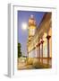 The Cao Dai temple in Vung Tau lit up at dusk with the full moon to the left of the tower, Vietnam-Brian Graney-Framed Photographic Print