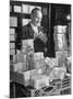 The Chief Cashier Counting Piles of Money-Walter Sanders-Mounted Photographic Print