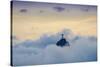 The Christ Statue (Cristo Redentor) on the summit of Corcovado mountain in a sea of clouds-Alex Robinson-Stretched Canvas
