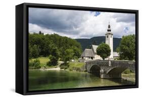 The church of St. John the Baptist and the stone bridge on Lake Bohinj, Slovenia, Europe-Sergio Pitamitz-Framed Stretched Canvas