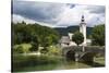 The church of St. John the Baptist and the stone bridge on Lake Bohinj, Slovenia, Europe-Sergio Pitamitz-Stretched Canvas