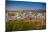 The City Wall of Mehrangarh Fort Towering over the Blue Rooftops in Jodhpur, the Blue City-Laura Grier-Mounted Photographic Print