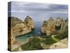 The cliffs and sea stacks of Ponta da Piedade, Algarve, Portugal.-Martin Zwick-Stretched Canvas